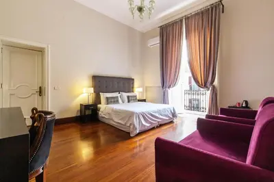 Letto o letti in una camera di Gramsci Suites