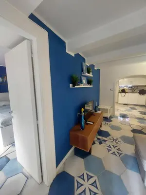 Area soggiorno di Be Blu Apartment