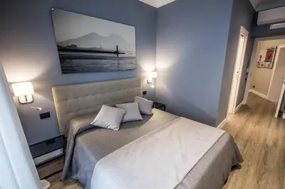 Letto o letti in una camera di B&B Art House