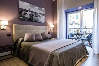 Letto o letti in una camera di B&B Art House