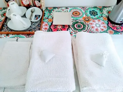 Letto o letti in una camera di L'Atelier Vedi Napoli ai tuoi piedi