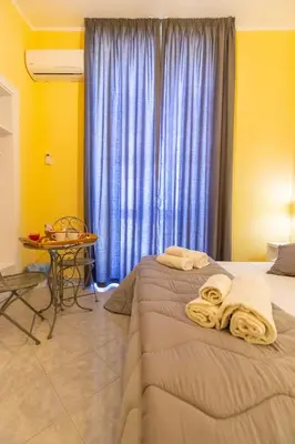 Letto o letti in una camera di B&B Trianon