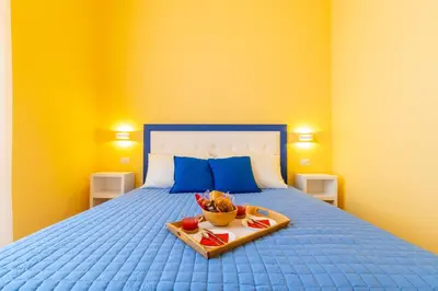 Letto o letti in una camera di B&B Trianon