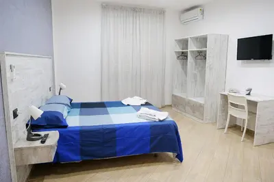 Letto o letti in una camera di b&b annunziata dream