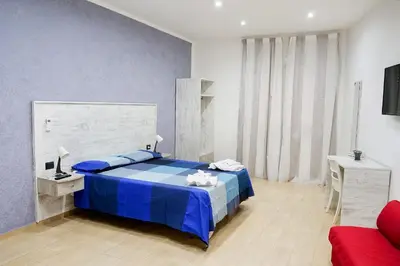 Letto o letti in una camera di b&b annunziata dream