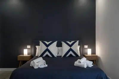 Letto o letti in una camera di Sant'Alfonso Bed and Breakfast Napoli