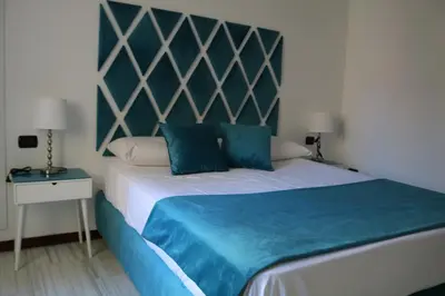 Letto o letti in una camera di Neapolis City Life