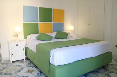 Letto o letti in una camera di SuiteNapoliSantaLucia