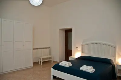 Letto o letti in una camera di Casa del Palumbo