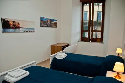 Letto o letti in una camera di Casa del Palumbo