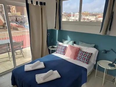 Letto o letti in una camera di Relais Tribunali with panoramic terrace
