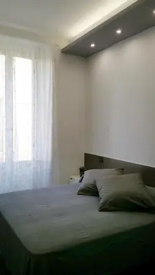 Letto o letti in una camera di Centro Storico - Fermata MONTESANTO