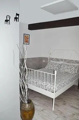 Letto o letti in una camera di Casa Mya - Studio Flat