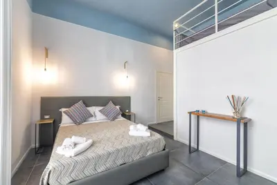 Letto o letti in una camera di Be Italian Flat Duomo 319