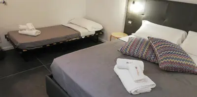 Letto o letti in una camera di Be Italian Flat Duomo 319