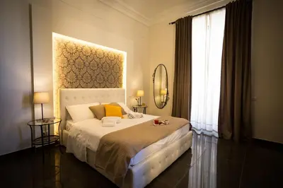 Letto o letti in una camera di B&B Depretis19