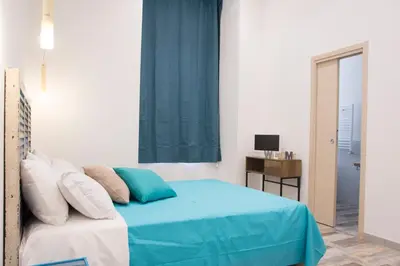 Letto o letti in una camera di Filì