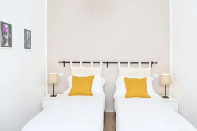 Letto o letti in una camera di Residenza Toledo by Wonderful Italy