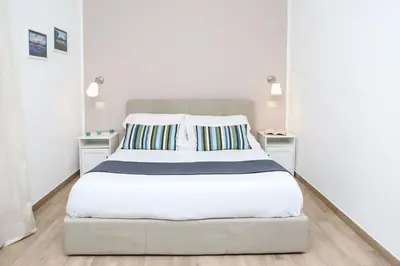 Letto o letti in una camera di Residenza Toledo by Wonderful Italy