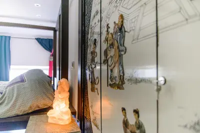 Letto o letti in una camera di luxury suite San Carlo