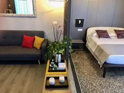 Letto o letti in una camera di Dimora Augusteo