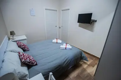 Letto o letti in una camera di Bellorizzonte