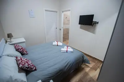 Letto o letti in una camera di Bellorizzonte