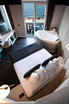 Letto o letti in una camera di Relais sul Mare Boutique Hotel