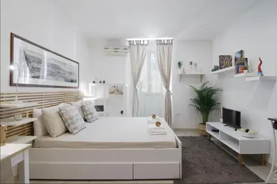 Letto o letti in una camera di Lorenzo's Art Studio - SpaccaNapoli 2 minuti