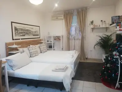 Letto o letti in una camera di Lorenzo's Art Studio - SpaccaNapoli 2 minuti