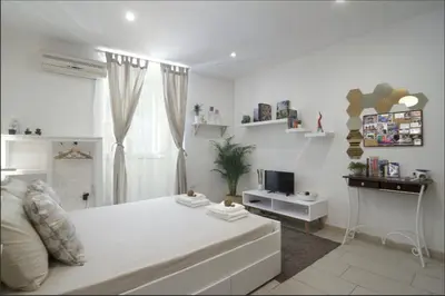 Letto o letti in una camera di Lorenzo's Art Studio - SpaccaNapoli 2 minuti