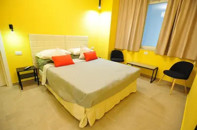 Letto o letti in una camera di Delco Naples