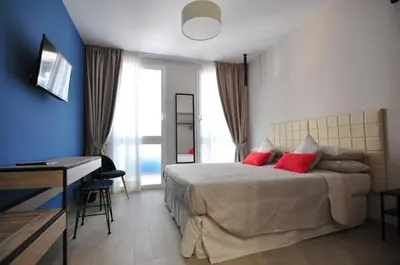 Letto o letti in una camera di Delco Naples