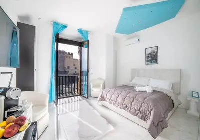 Letto o letti in una camera di Tiffany & Babylon Luxury Stay