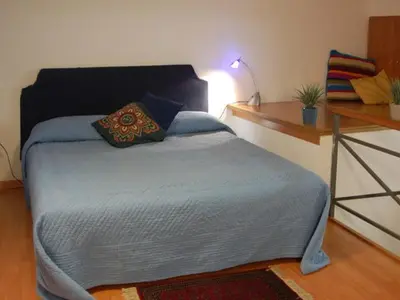 Letto o letti in una camera di MiCasaTuCasa