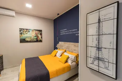Letto o letti in una camera di B&B i Maestri