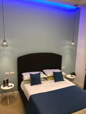 Letto o letti in una camera di DOMO B&B