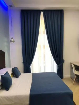 Letto o letti in una camera di DOMO B&B