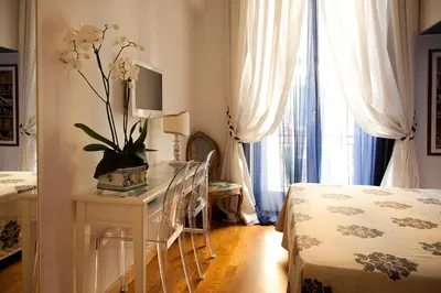 Letto o letti in una camera di B&B Orsini 46