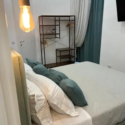 Letto o letti in una camera di Napoli DownTown