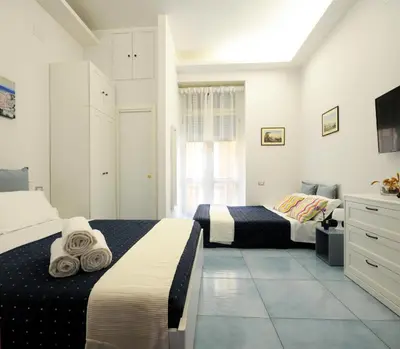 Letto o letti in una camera di Casa Sassolini