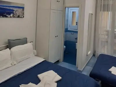 Letto o letti in una camera di Casa Sassolini