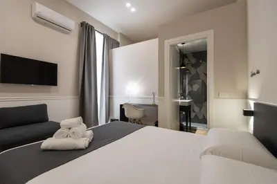 Letto o letti in una camera di Five Boutique Rooms