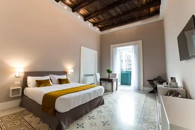 Letto o letti in una camera di Foro Carolino S&B