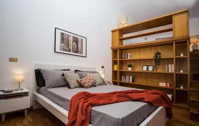 Letto o letti in una camera di Casa Frangiò Modern Apartment Historical Centre - Authentic Neapolitan Apartment for Families and Friends