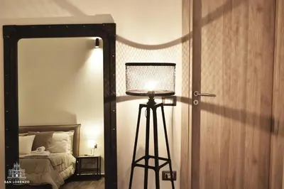 Letto o letti in una camera di San Lorenzo's home