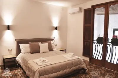 Letto o letti in una camera di San Lorenzo's home