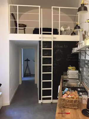 Cucina o angolo cottura di CosyHomeSuite Napoli