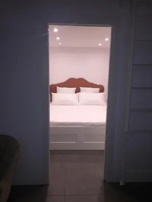 Letto o letti in una camera di CosyHomeSuite Napoli