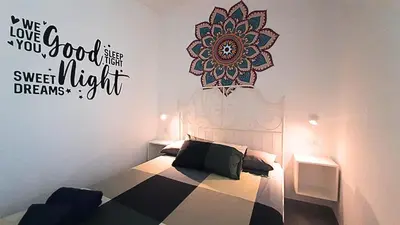 Letto o letti in una camera di La stanza di Daria - un nido silenzioso nel cuore del centro storico